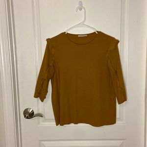 Mustard yellow top with frill sleeve details